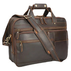 Brown leather briefcase with shoulder strap on a white background